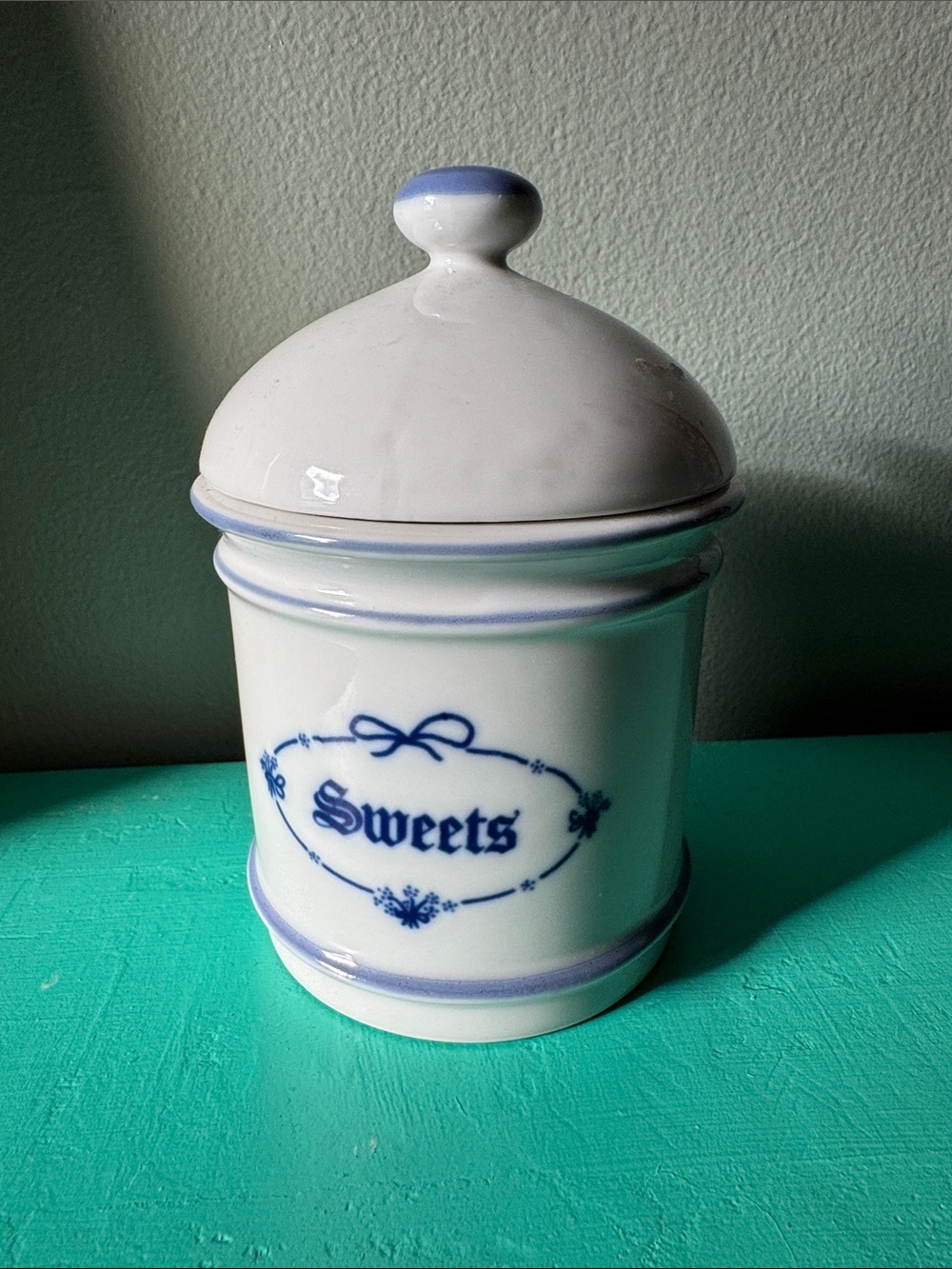 vintage ceramic 'Sweets' canister w/ blue bow detail
